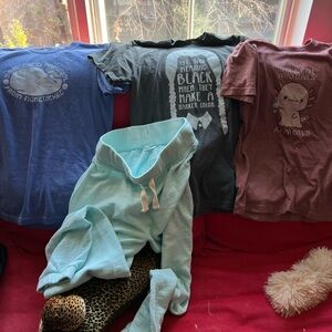 Bundle of t shirts and sweatp pants